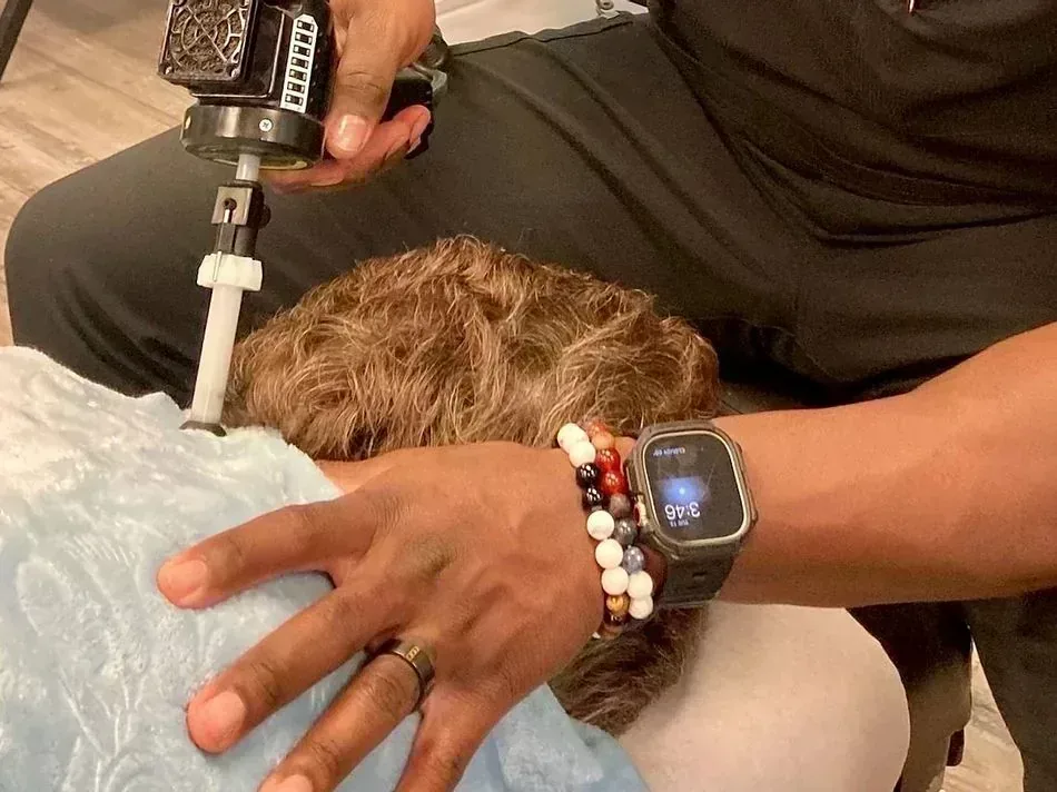 Arthrostim instrument applied along a patient’s spine