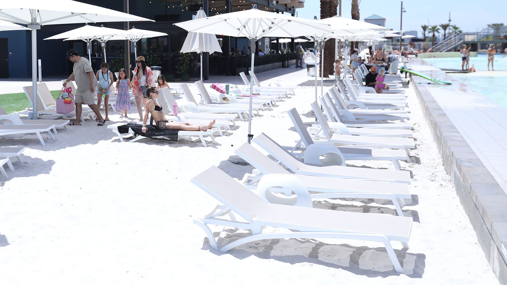 White sand beach with loungers and umbrellas